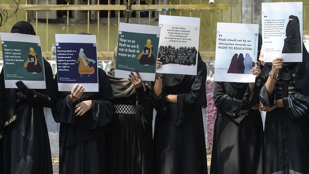 Protesters demand that hijab be allowed in educational institutions. Credit: AFP Photo