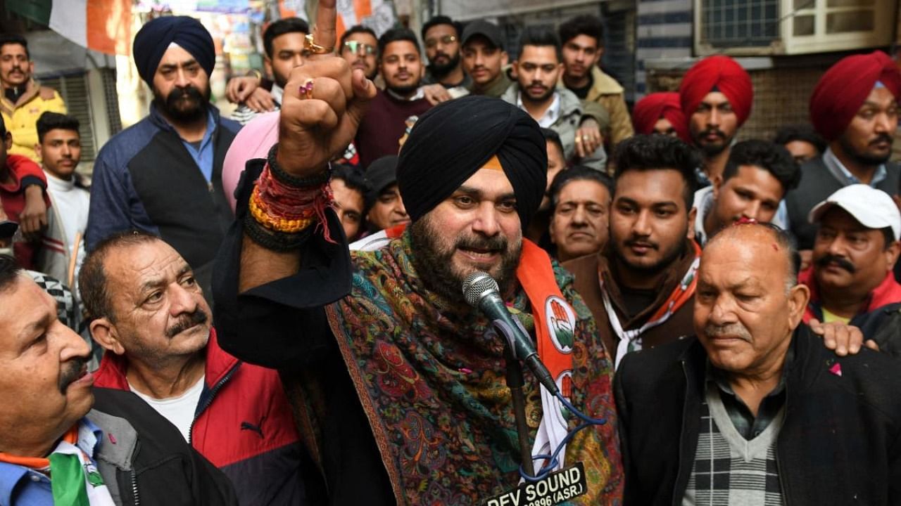 Punjab Congress party president and Congress party candidate Navjot Singh Sidhu (C) addresses to his supporters during an election campaign for the upcoming Punjab state assembly elections. Credit: AFP Photo