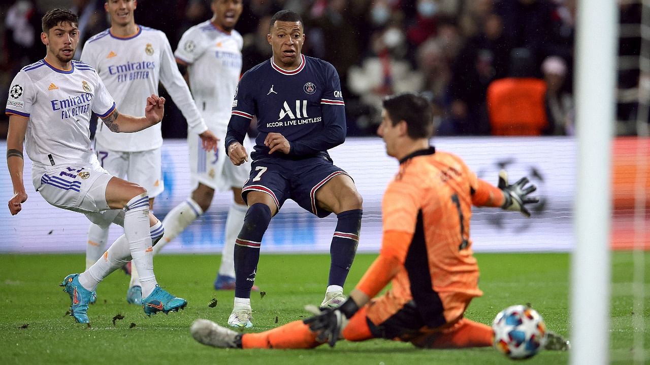 Kylian Mbappe cut inside two players and shot the ball through Thibaut Courtois' legs in stoppage time. Credit: Reuters Photo