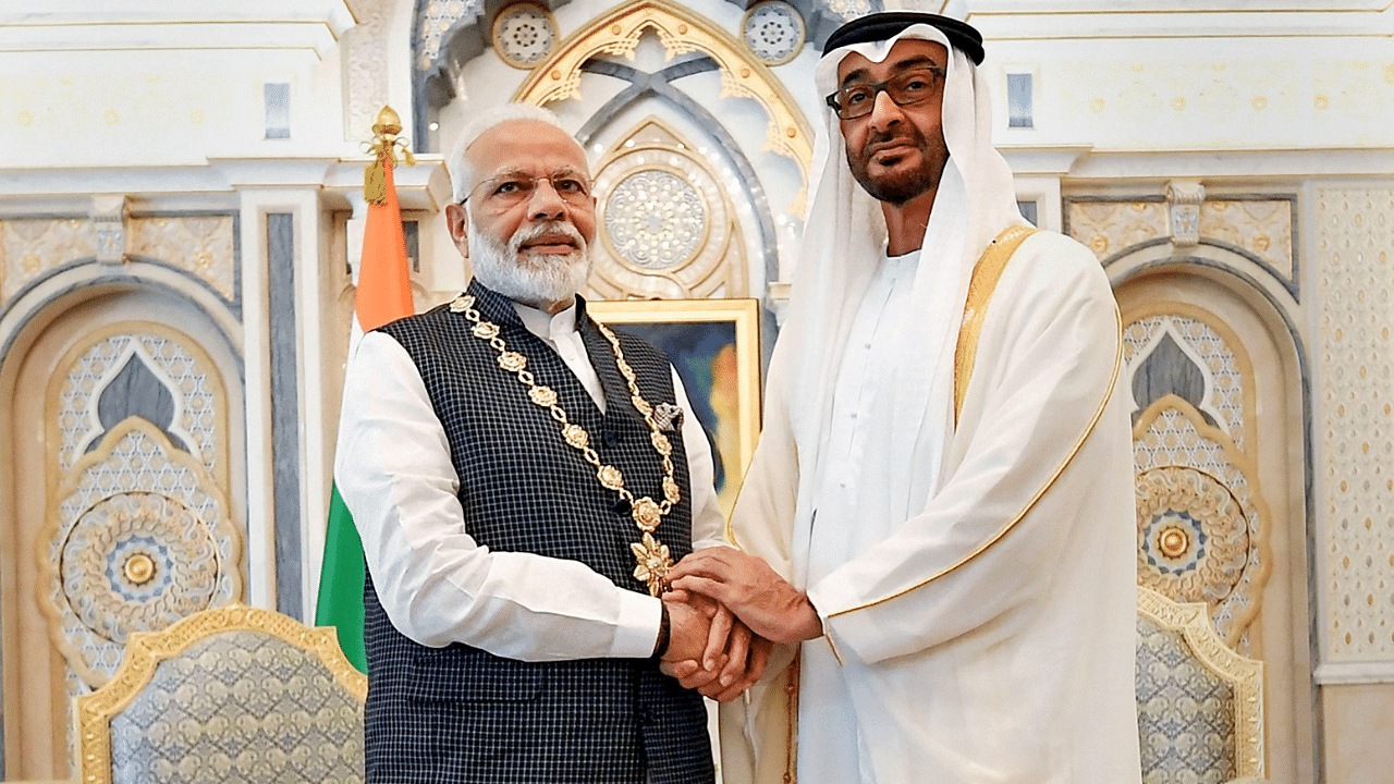 Prime Minister Narendra Modi shakes hands with Crown Prince of the Emirate of Abu Dhabi and Deputy Supreme Commander of the United Arab Emirates Armed Forces Sheikh Mohammed bin Zayed Al Nahyan. Credit: PTI Photo