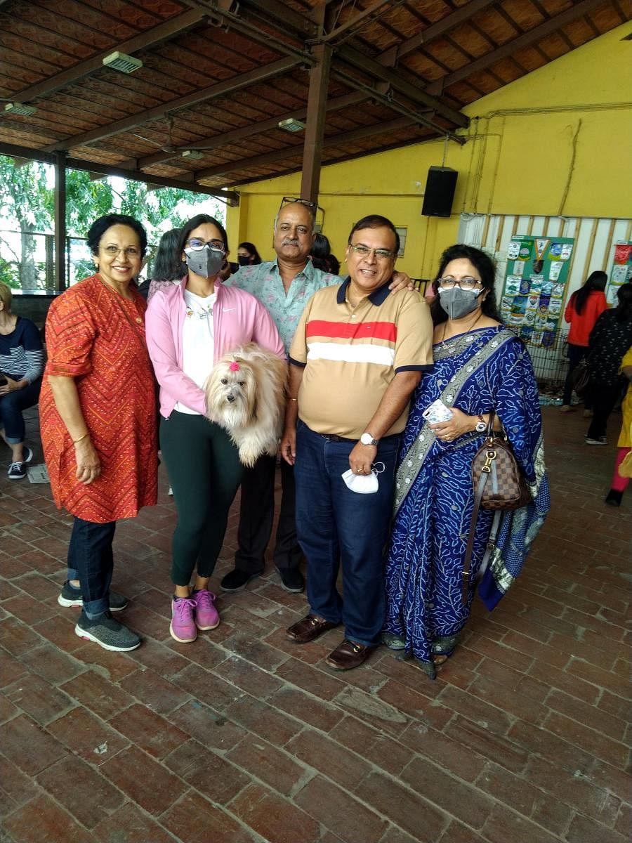 Rotarians Gowri Oza, Ranga Rao (third from left), R Girish and Elizabeth Cherian, with Dr Rashmi (second from left), at a pet adoption camp on Sunday.