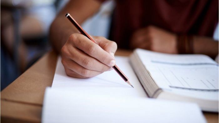 Special arrangements have been made for students having flu-like symptoms to write their papers in a separate room. Credit: iStock Photo