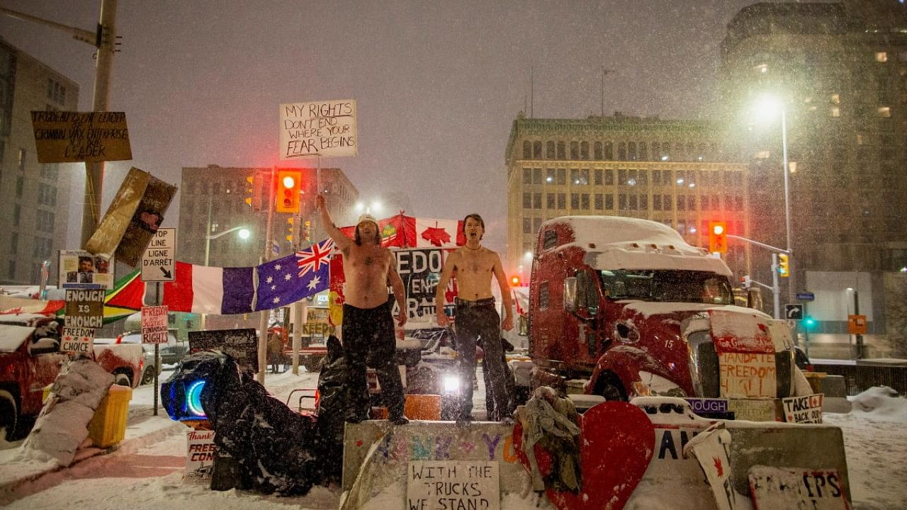 Truckers and supporters continue to protest Covid-19 vaccine mandates in Ottawa. Credit: Reuters Photo