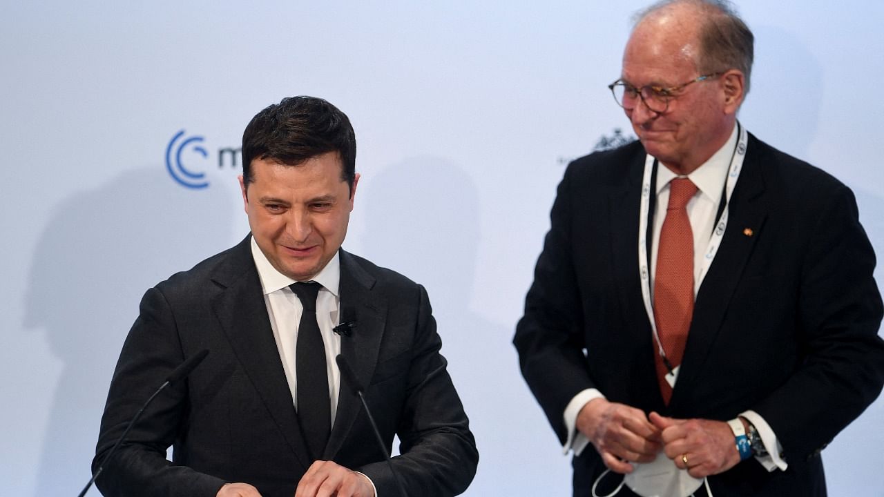 Munich Security Conference Chairman Wolfgang Ischinger stands next to Ukrainian President Volodymyr Zelenskiy ahead of his speech during the annual Munich Security Conference, in Munich. Credit: Reuters Photo