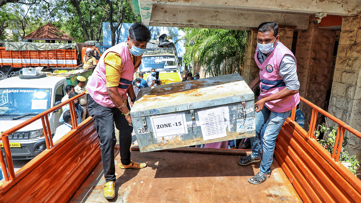 Ballot boxes and other election material being loaded into a lorry for the local bodies' polls, in Toothukudi. Credit: PTI Photo