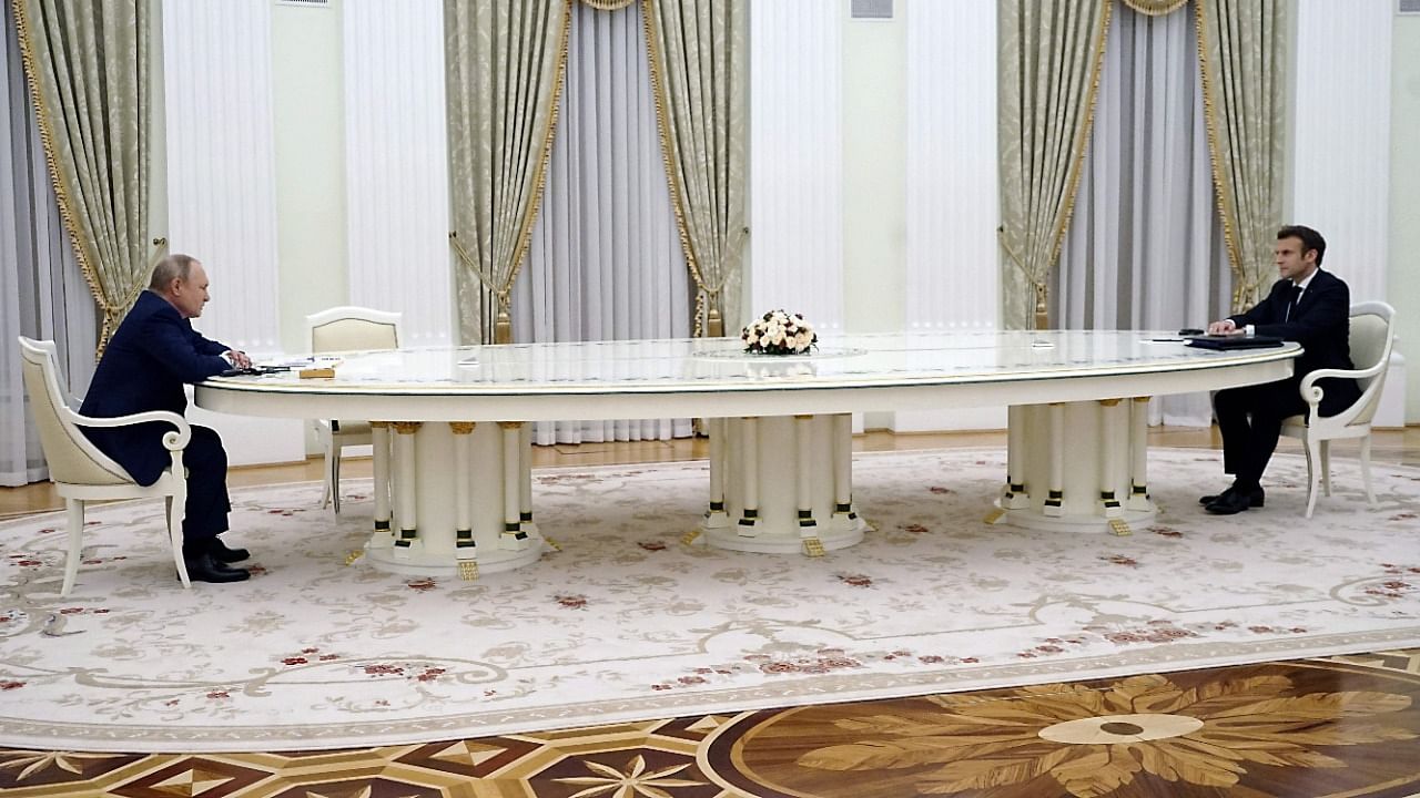 Russian leader Vladimir Putin's oversized table has become an unlikely star of diplomatic efforts to ease the Ukraine crisis, and a source of pride for OAK furniture company, the small Italian firm established in Cantu, near Como, that claims to have made it and hopes it will help peace efforts. Credit: AFP File Photo