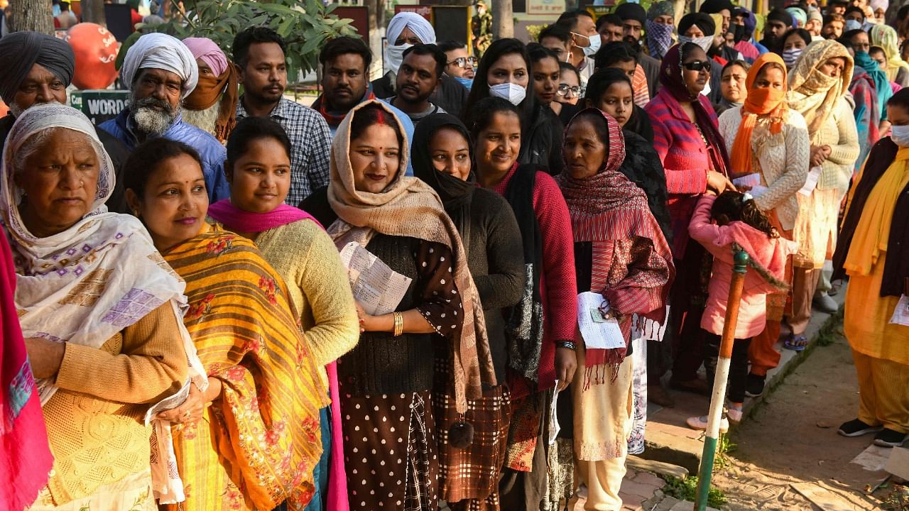 Voters line up to exercise their franchise in Amritsar. Credit: AFP Photo