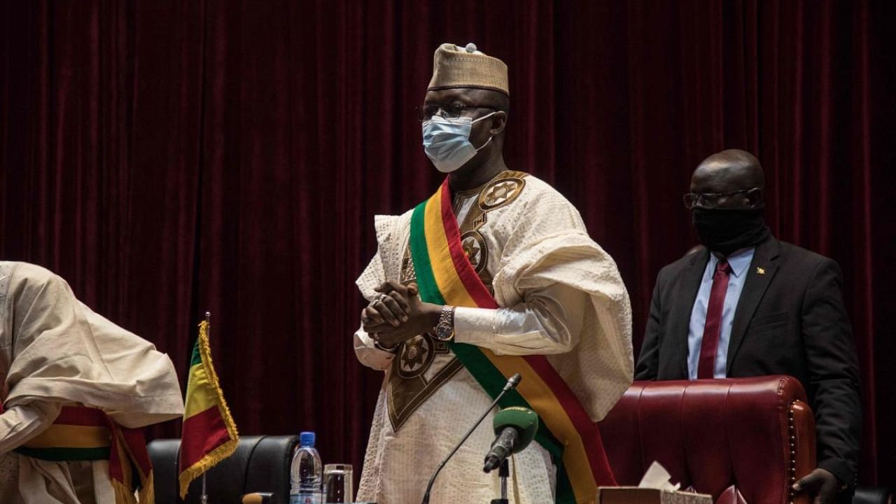 President of the National Transitional Council (NTC), Malick Diaw, addresses members of the council during a meeting to vote on a revised charter in Bamako. Credit: AFP Photo