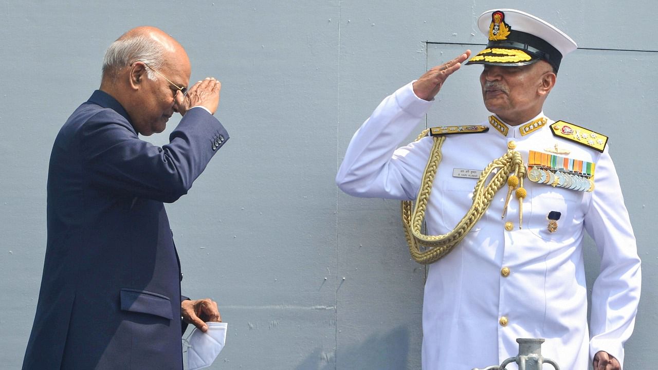 President Ram Nath Kovind and Chief of Naval Staff Admiral R Hari Kumar salute each other during Presidential Fleet Review-2022. Credit: PTI Photo