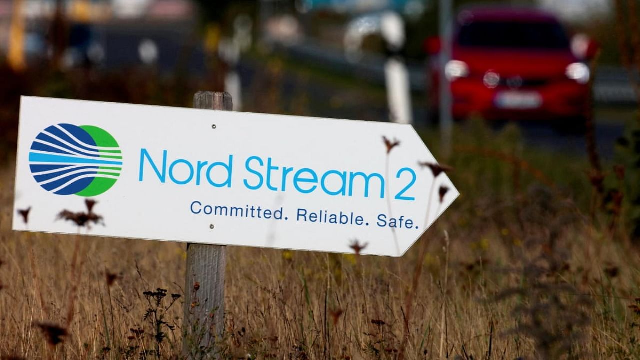 A road sign directs traffic towards the Nord Stream 2 gas line landfall facility entrance in Lubmin, Germany. Credit: Reuters Photo