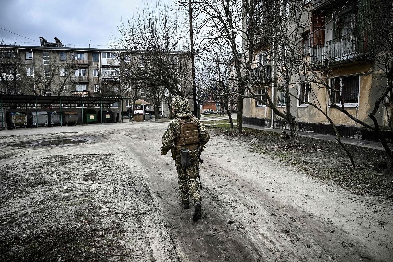 A Ukraine army soldier walks in the town of Schastia, near the eastern Ukraine city of Lugansk. Credit: AFP Photo