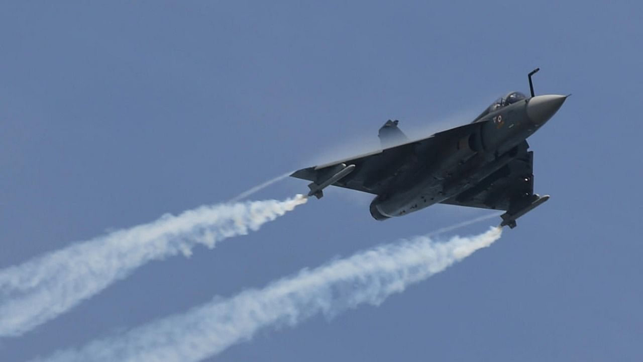 An Indian Air Force Tejas light combat aircraft flies past during a preview of the Singapore Airshow in Singapore. Credit: AFP Photo