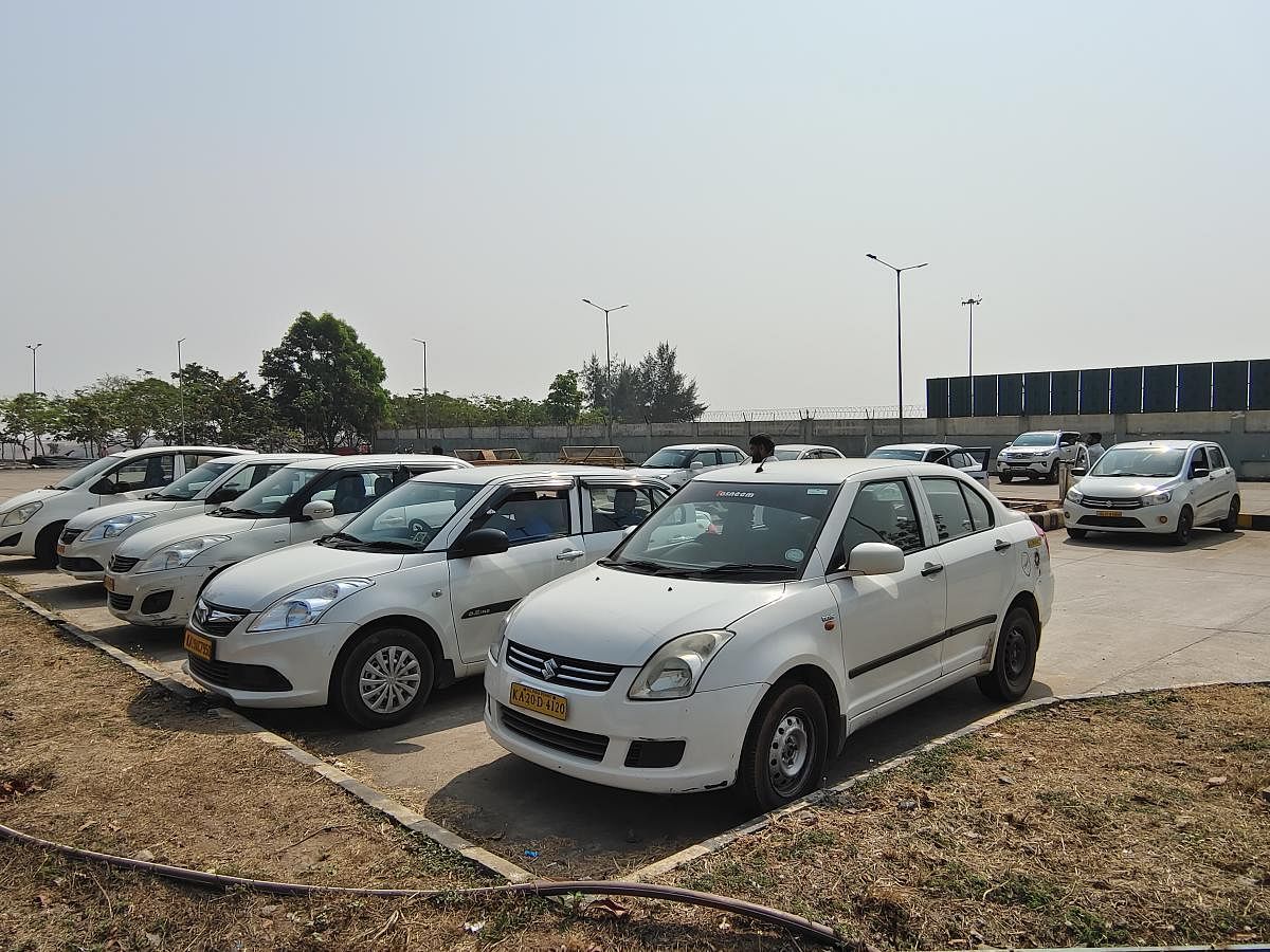 Taxis parked at Mangaluru International Airport.  