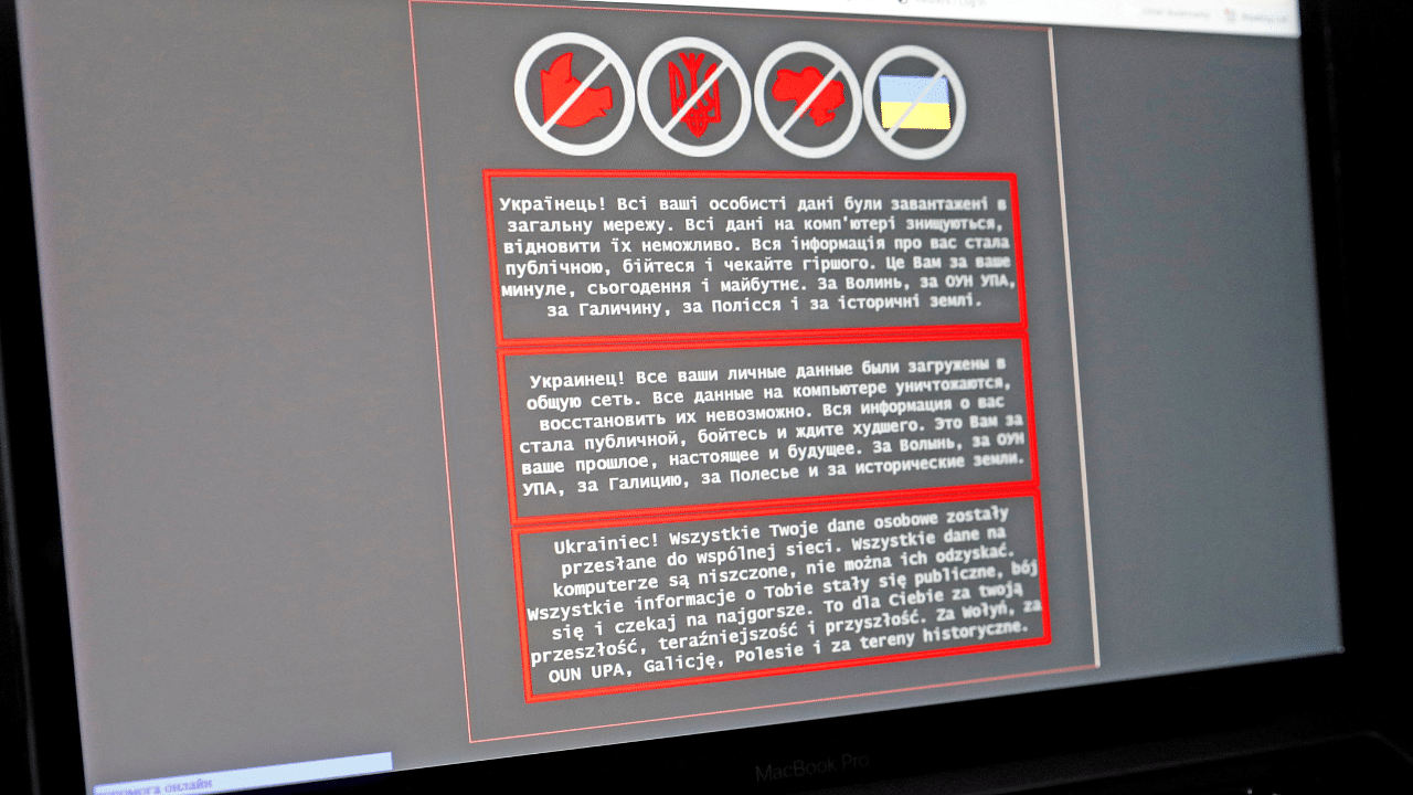 A laptop screen displays a warning message on the official website of the Ukrainian Foreign Ministry, in this illustration. Credit: Reuters Photo