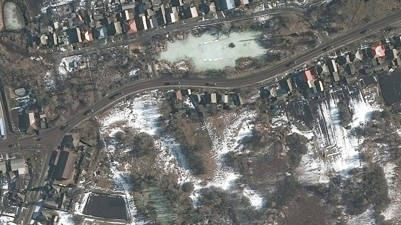 This Maxar satellite image taken and released on February 23, 2022 shows a military convoy, south of Golovchino. Credit: AFP Photo