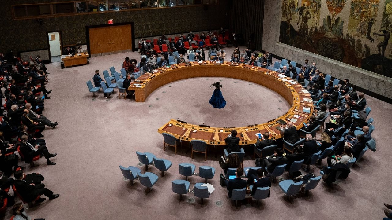  Members of the United Nations Security Council cast their votes during a meeting at United Nations headquarters. Credit: AFP File Photo