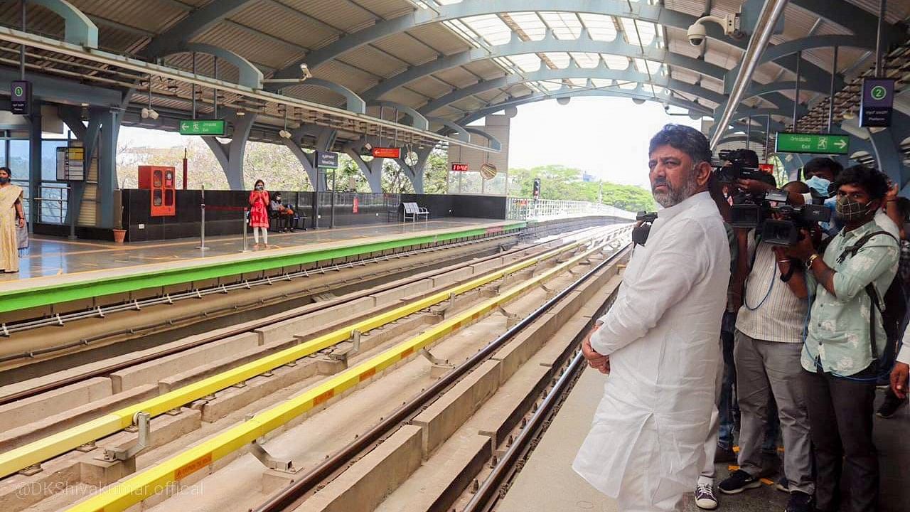 KPCC president DK Shivakumar waits for the metro as he took stock of the preparation for the Mekedatu foot march. Credit: DH Photo