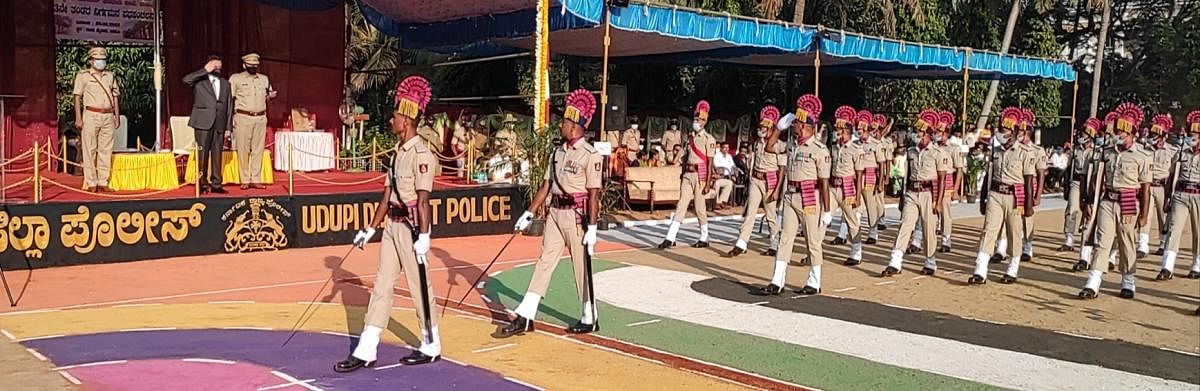 District and Sessions Judge Subramanya J N receives the guard of honour during the passing out parade for the 13th batch of Udupi district armed reserve police constablesorganised at Chandu Maidan in Udupi on Friday.