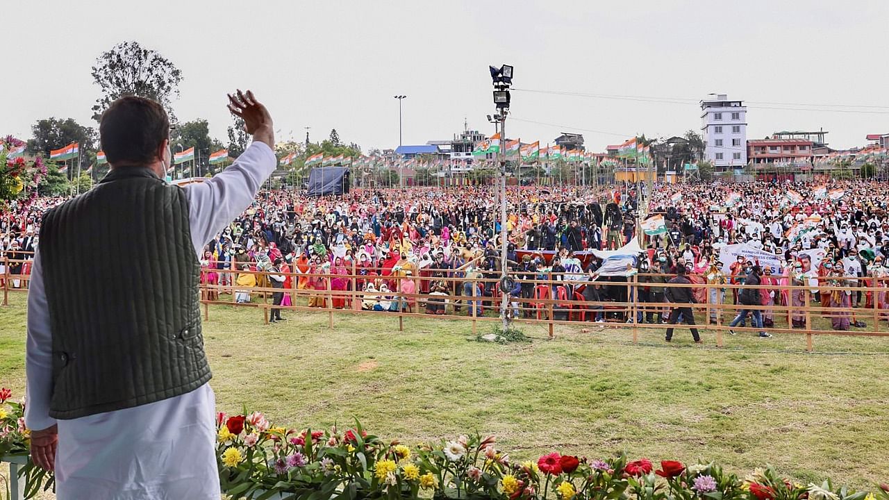 Congress leader Rahul Gandhi waves at the supporters, during an election campaign rally for the upcoming Manipur Assembly elections, in Imphal. Credit: PTI Photo