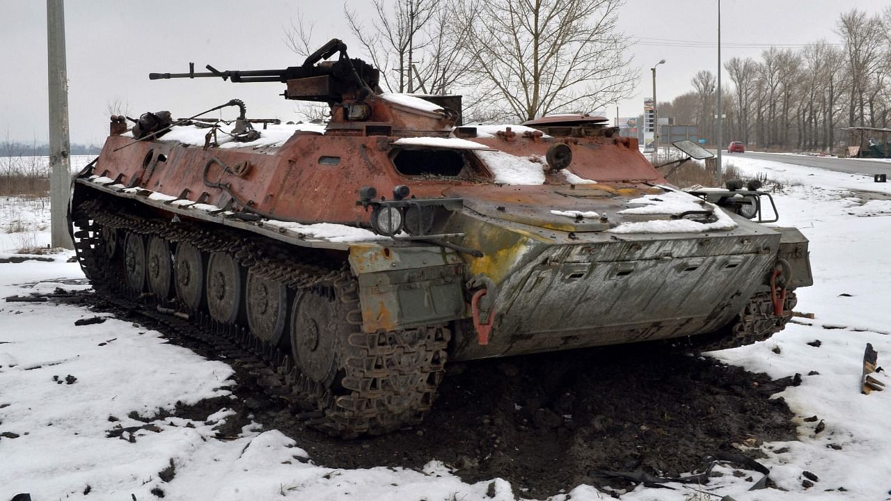 A destroyed Russian military vehicle is seen on the roadside on the outskirts of Kharkiv. Credit: AFP Photo