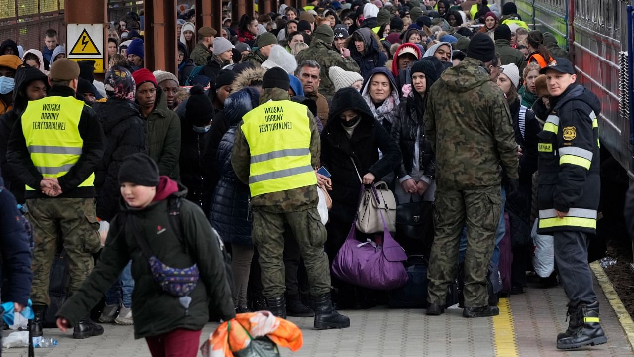 Refugees from Ukraine arrive to the railway station in Przemysl, Poland. Credit: AP Photo
