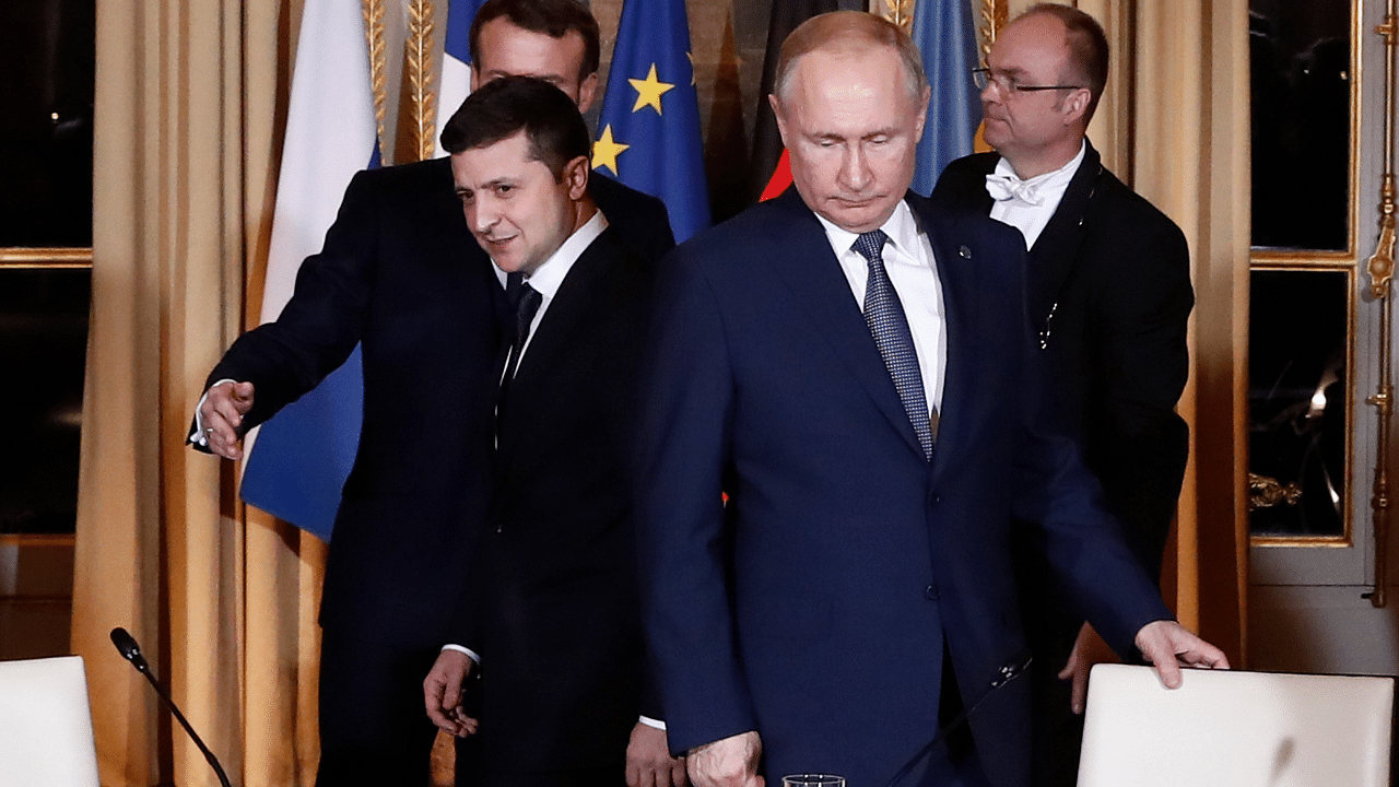 Russian President Vladimir Putin, right, and Ukrainian President Volodymyr Zelenskyy. Credit: AP Photo