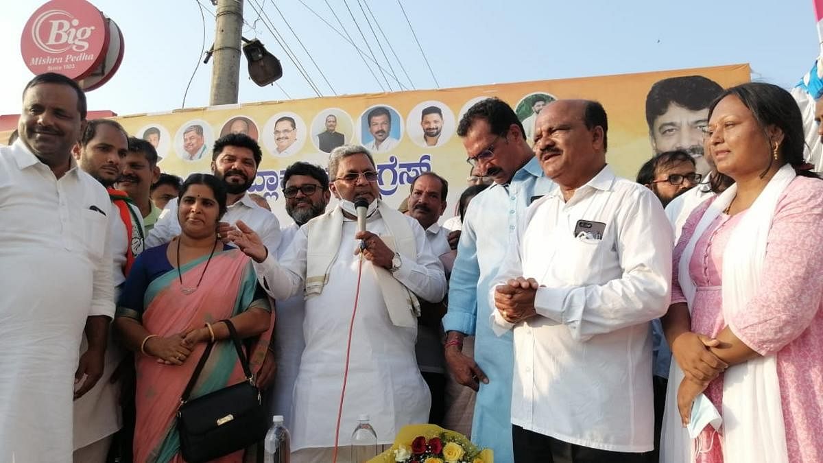 Congress Legislative Party leader and former chief minister Siddaramaiah addresses party workers in Kallapu, en route to Ullal Uroos on Saturday.