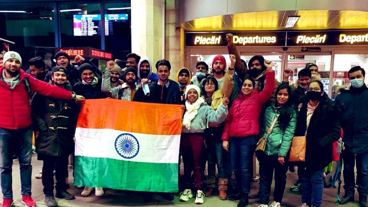 Indian nationals evacuated from Ukraine arrive at New Delhi's IGI airport. Credit: Twitter/@MEAIndia