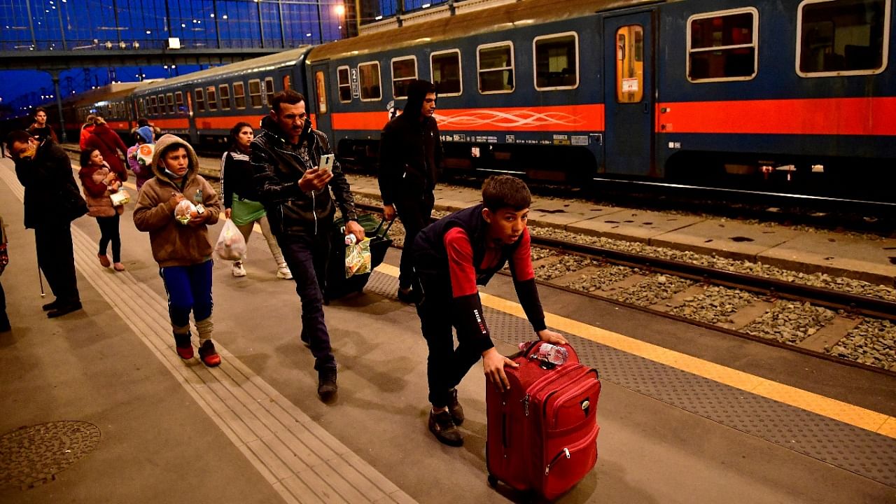 A family fleeing from Ukraine arrives at Nyugati station, after Russia launched a massive military operation against Ukraine, in Budapest. Credit: Reuters photo