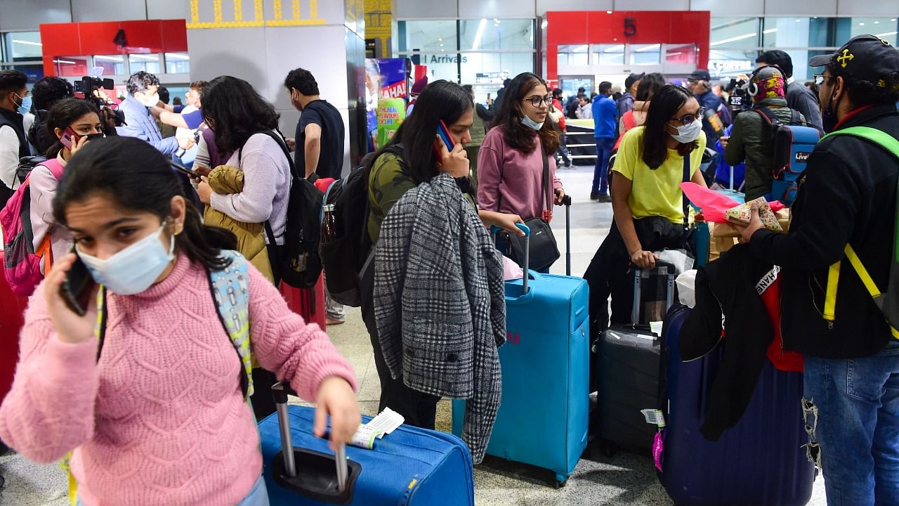  Indian nationals, evacuated from war-torn Ukraine, upon their arrival at the IGI Airport, in New Delhi. Credit: PTI Photo