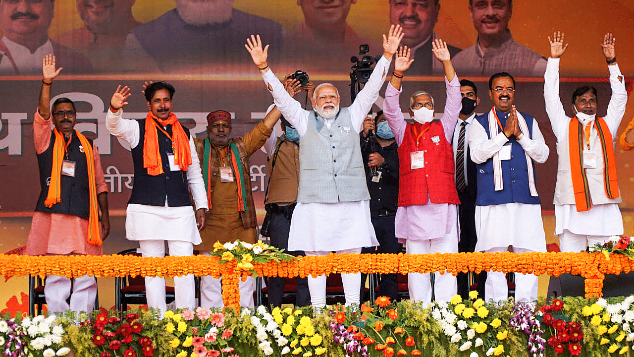 Prime Minister Narendra Modi with Uttar Pradesh Deputy Chief Minister Keshav Prasad Maurya and other BJP leaders, during the 'Booth Vijay Sammelan' for the ongoing Uttar Pradesh Assembly elections. Credit: PTI Photo