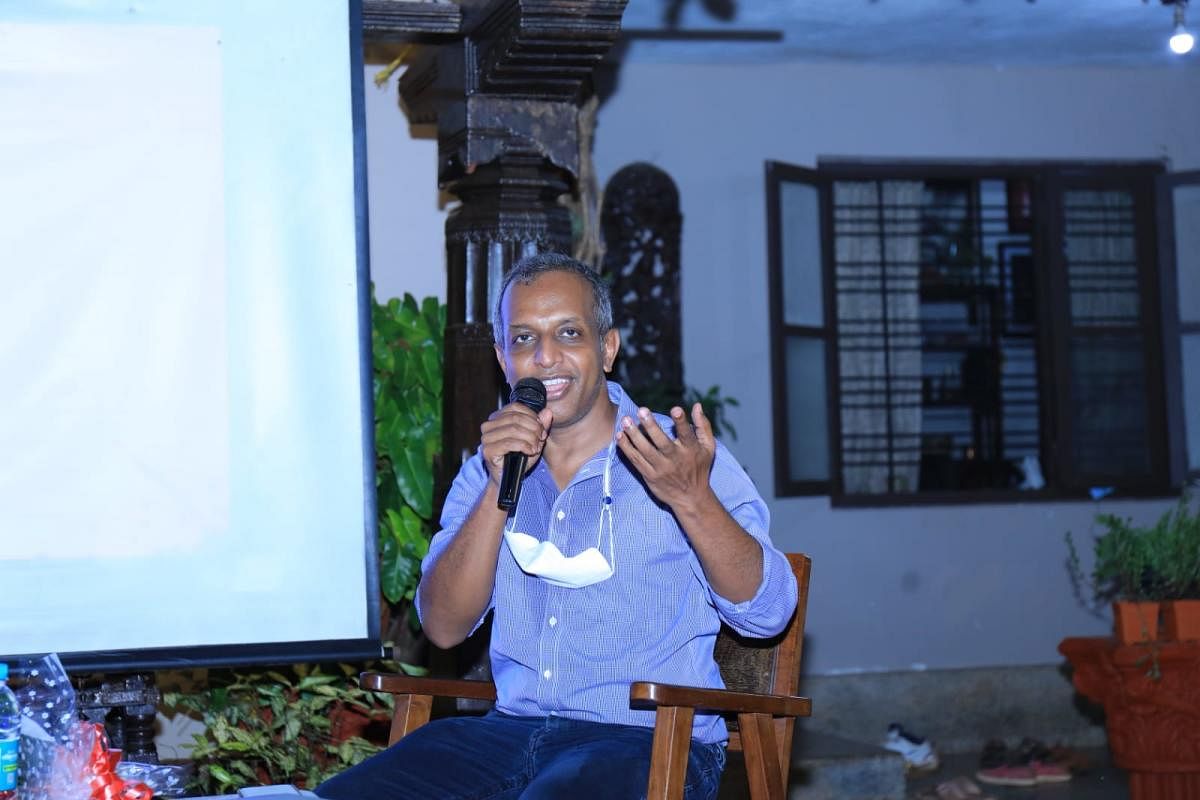 Internationally renowned visual artist L N Tallur speaks during an interaction at an art festival in Mangaluru.