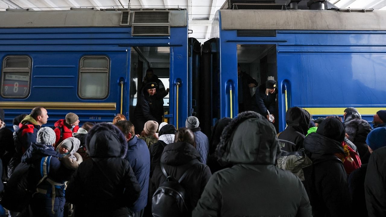 People wait to board an evacuation train from Kyiv to Lviv at Kyiv central train station. Credit: Reuters File Photo