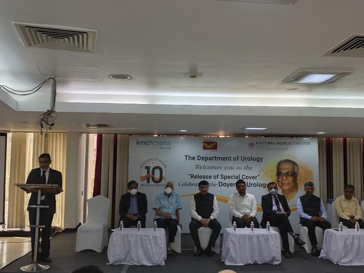 Dr Laxman Prabhu, consultant and HoD Urology, KMC Hospital, Mangaluru, speaks during the release of a special cover to honour the pioneering work by Prof H Sashidhar Bhat to establish the speciality of Urology in India, at TMA Pai Convention Centre, in Mangaluru. 