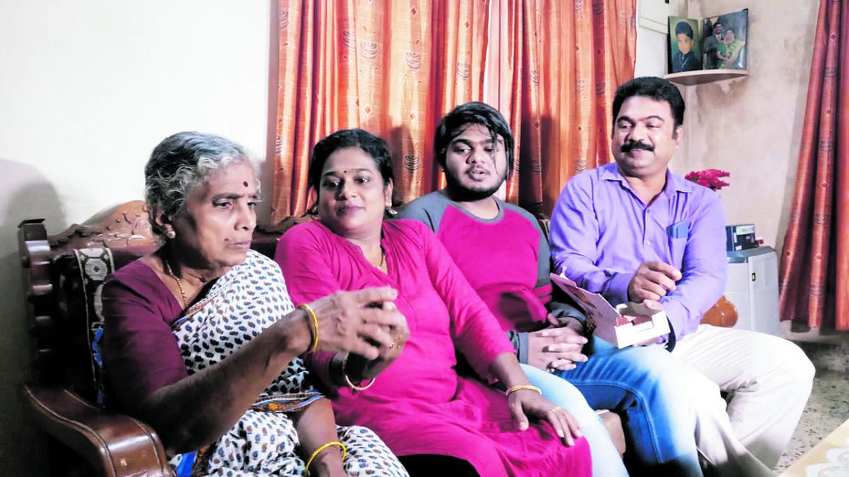 Mranal Rajesh with his parents and grandmother at his house in Udyavara in Udupi district.