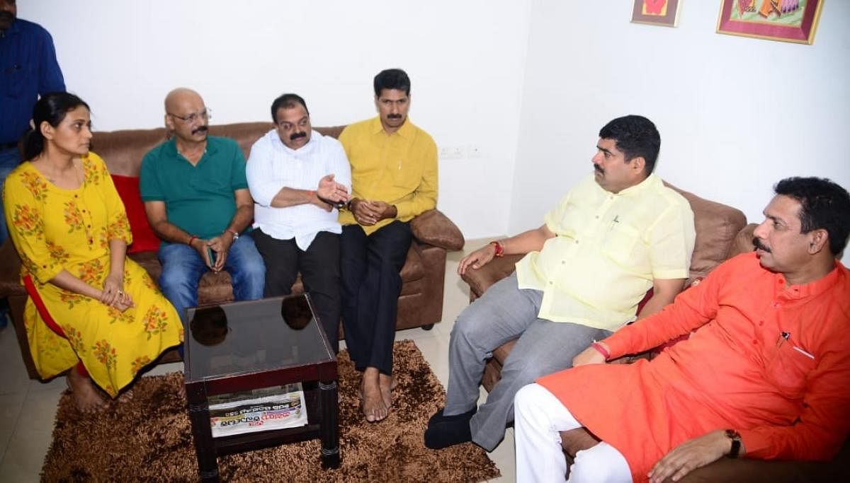 MP Nalin Kumar Kateel, Mangaluru South MLA D Vedavyas Kamath and others visit the residence of student Sakshi Sudhakar’s parents in Bejai, Mangaluru, on Wednesday. Sakshi is yet to return to India from Ukraine.