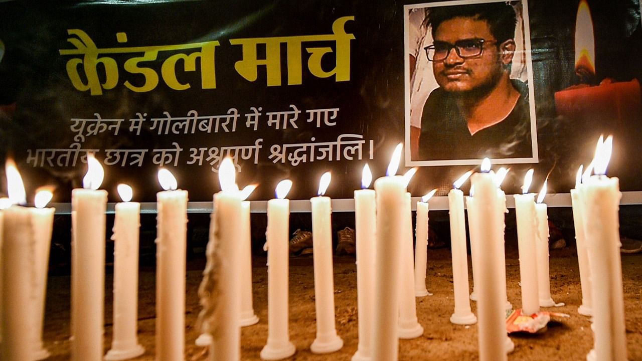 Candles being lit during a candle march of Indian Youth Congress to pay homage to Naveen Shekharappa, an Indian medical student who died due to Russian shelling in Ukraine's Kharkiv, in New Delhi, Tuesday, March 1, 2022. Credit: PTI Photo