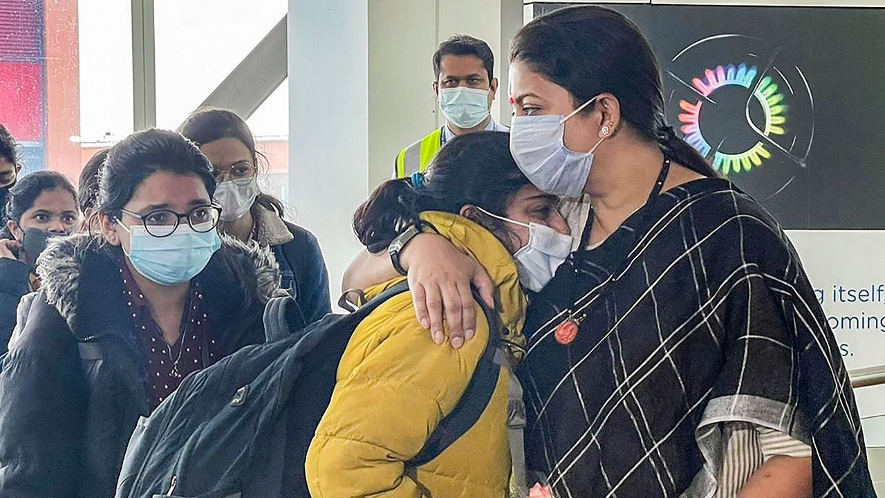 Smriti Irani welcomes students at the IGI Airport in Delhi. Credit: PTI Photo