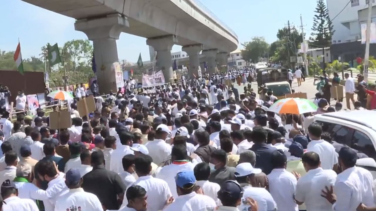 A screengrab of Congress' Mekedatu 'padayatra' shows party workers during the march on Mysuru Road in Bengaluru. Credit: Twitter/@INCKarnataka