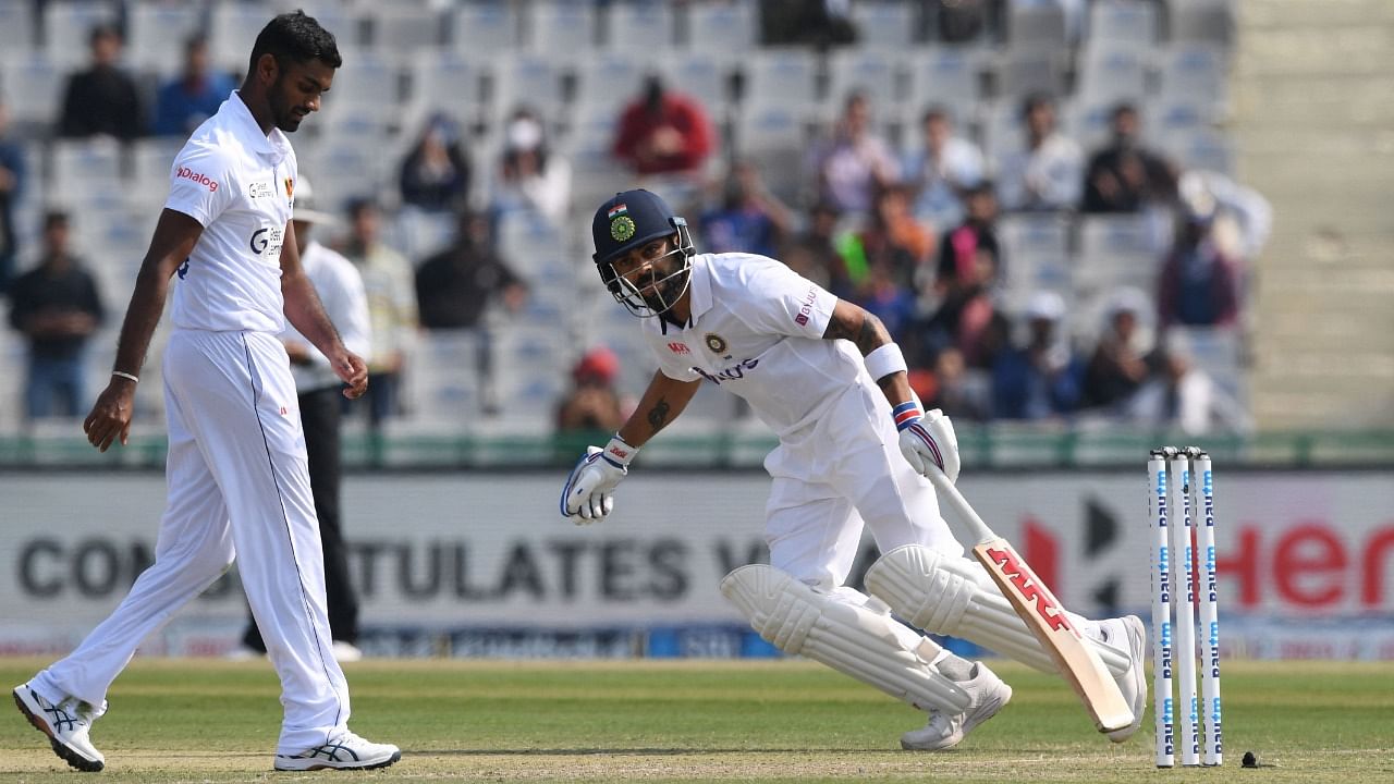 Virat Kohli in action during his 100th Test match. Credit: AFP Photo