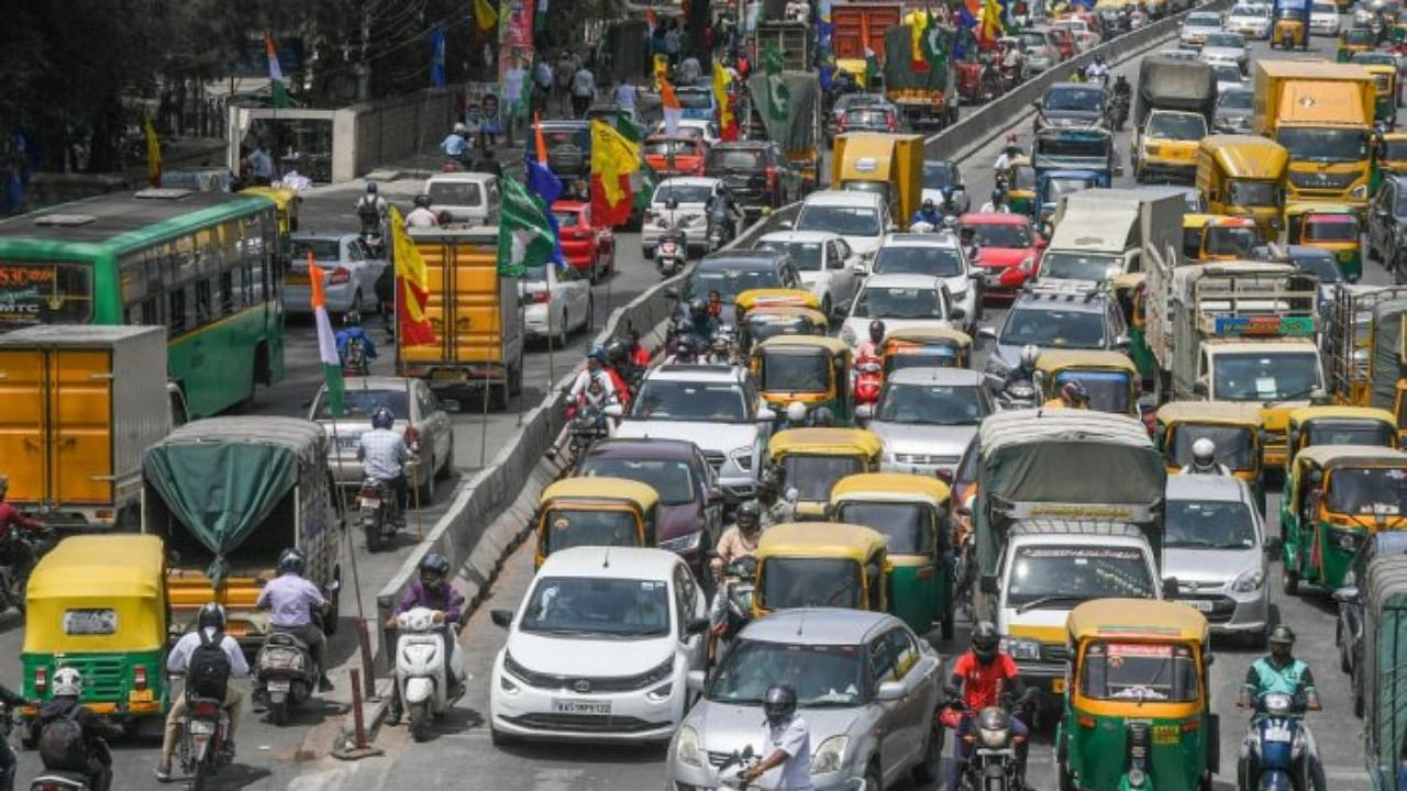 Traffic jam during Congress' padayatra at Madiwala in Bengaluru. Credit: DH Photo/S K Dinesh