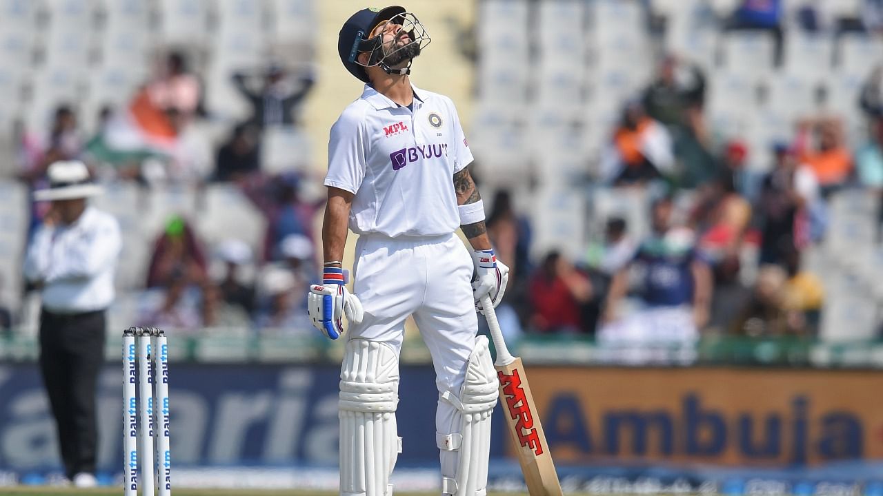 Kohli surpassed 8,000 Test runs during his innings before left-arm spinner Lasith Embuldeniya bowled the former captain who stood in disbelief. Credit: PTI Photo