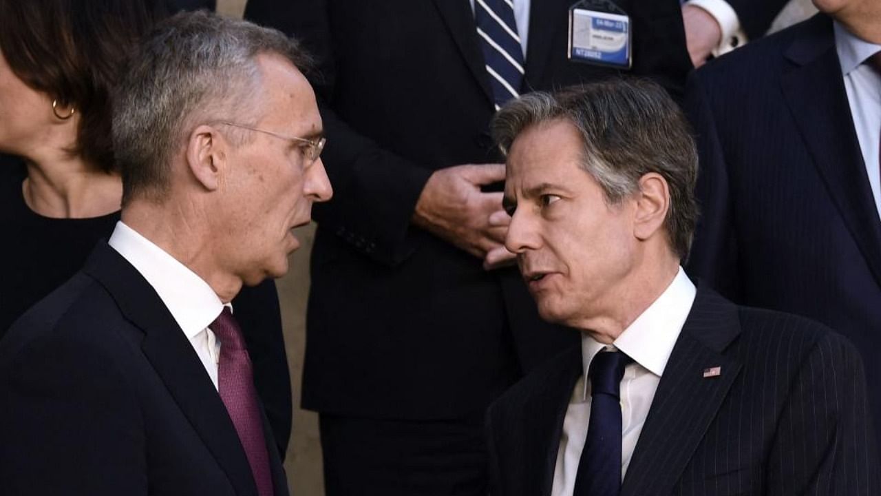 US State Secretary Antony Blinken (R) talks with NATO Secretary General Jens Stoltenberg. Credit: AFP Photo