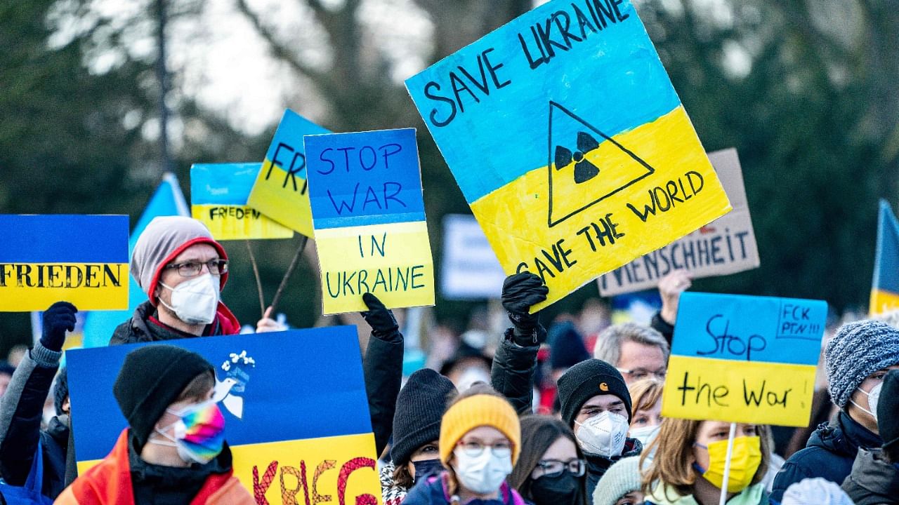 Protestors show support for Ukraine during a demonstration against Russia's invasion of Ukraine, in Hamburg. Credit: AFP Photo