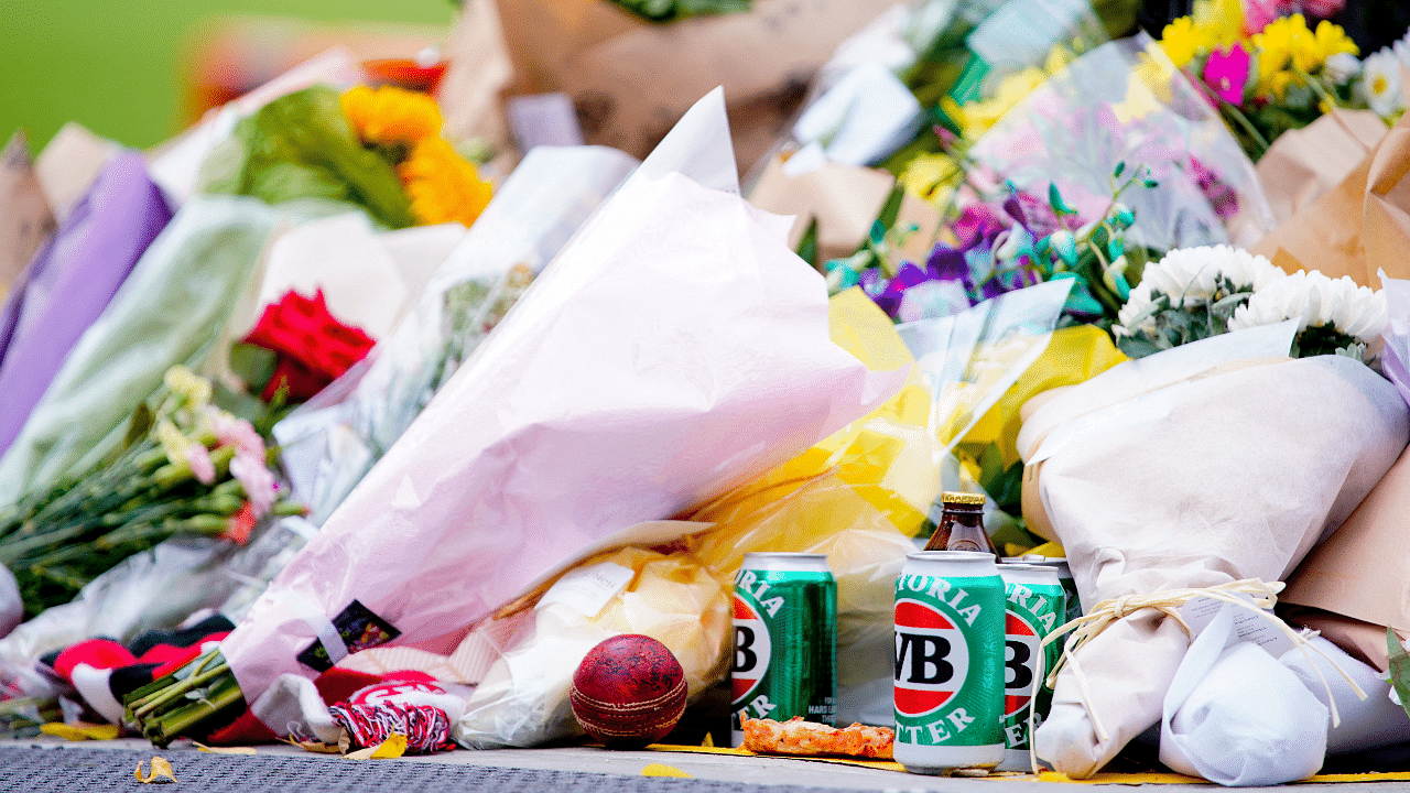 Tributes and flowers for late cricketer Shane Warne at the Melbourne Cricket Ground. Credit: Reuters Photo