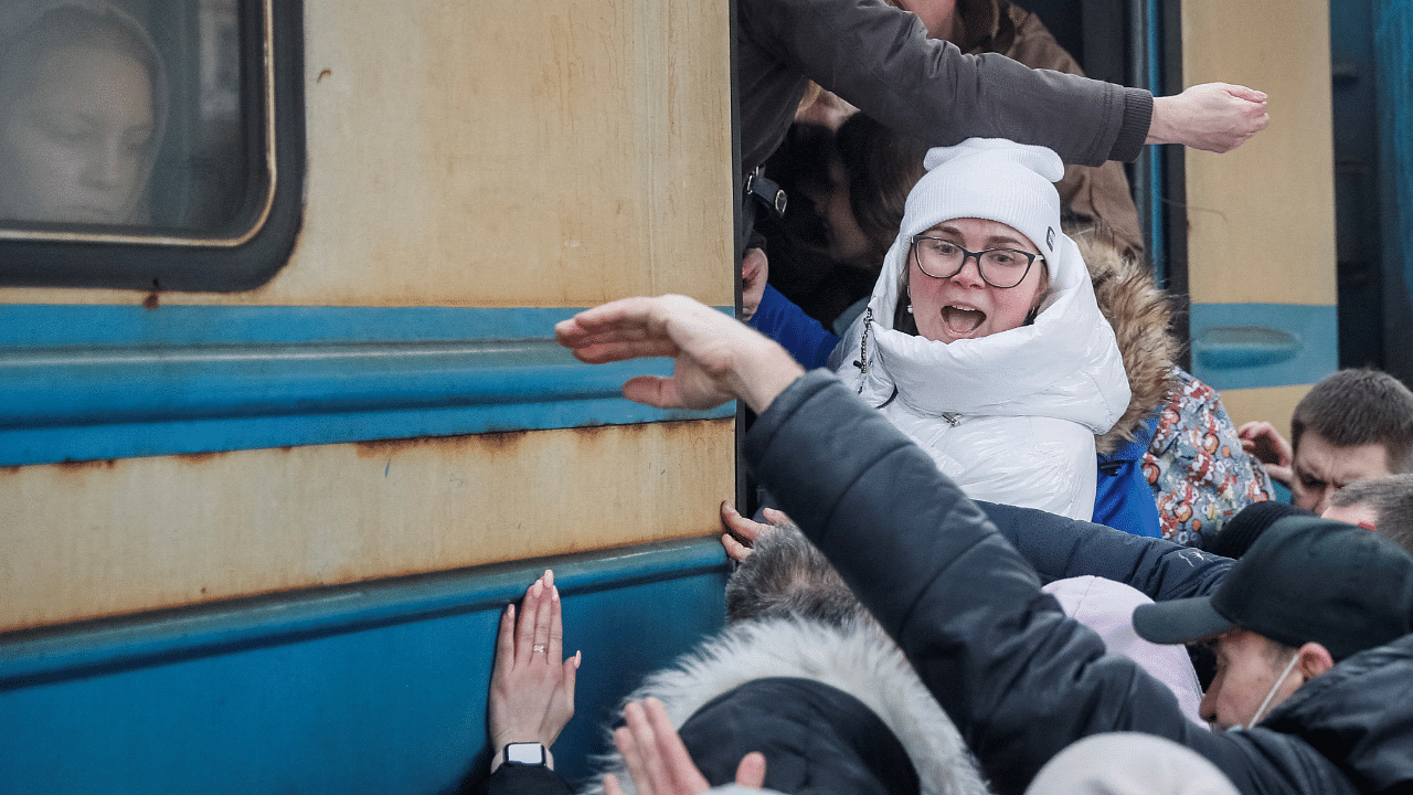 People board an evacuation train from Kyiv to Lviv at Kyiv central train station amid Russia's invasion of Ukraine. Credit: Reuters Photo