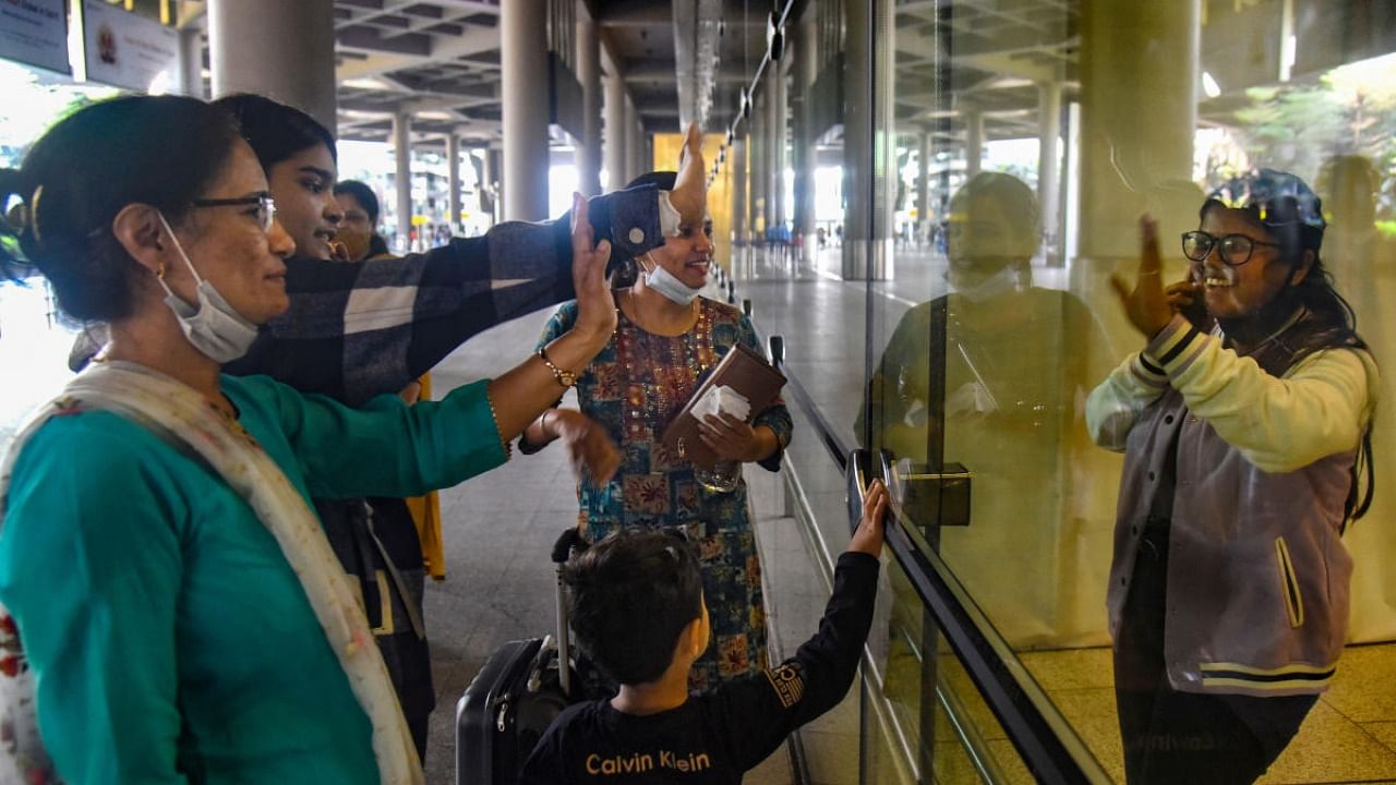 An Indian student, evacuated from crisis-hit Ukraine, being welcomed by relatives upon her arrival at the airport, in Mumbai. Credit: PTI Photo