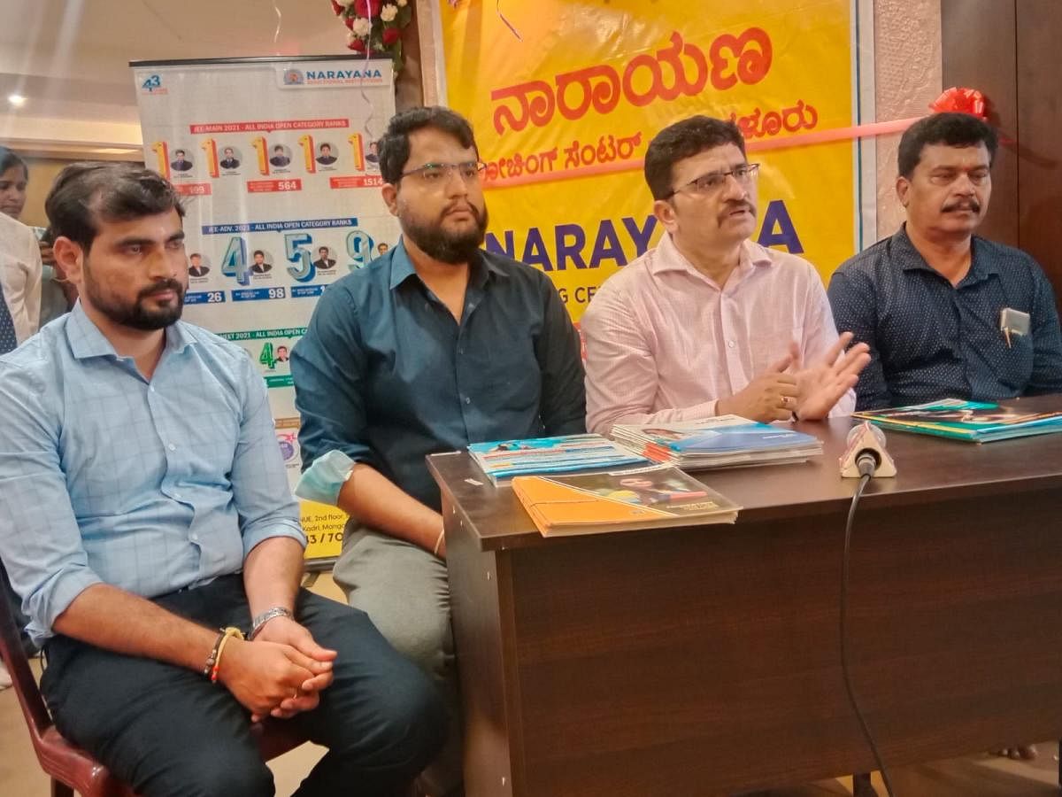 Hyderabad-based Narayana Educational Institution Dean B V Nagaraju interacts with reporters at the centre in Mangaluru on Monday.
