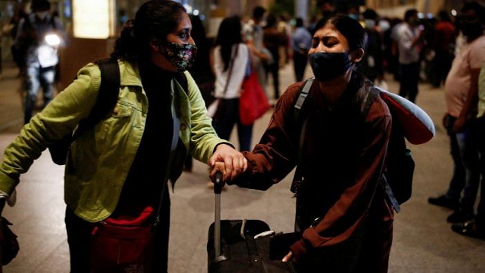 Students react as they leave the Chhatrapati Shivaji Maharaj International Airport after a special Air India flight carrying stranded Indian citizens from Ukraine landed in Mumbai. Credit: Reuters Photo