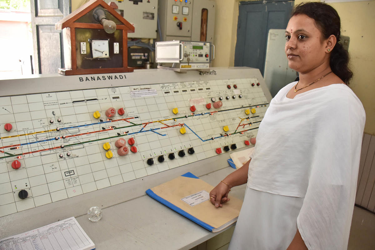 Kruthika S B, station master, has been working at the station since 2018. DH Photo by B K Janardhan